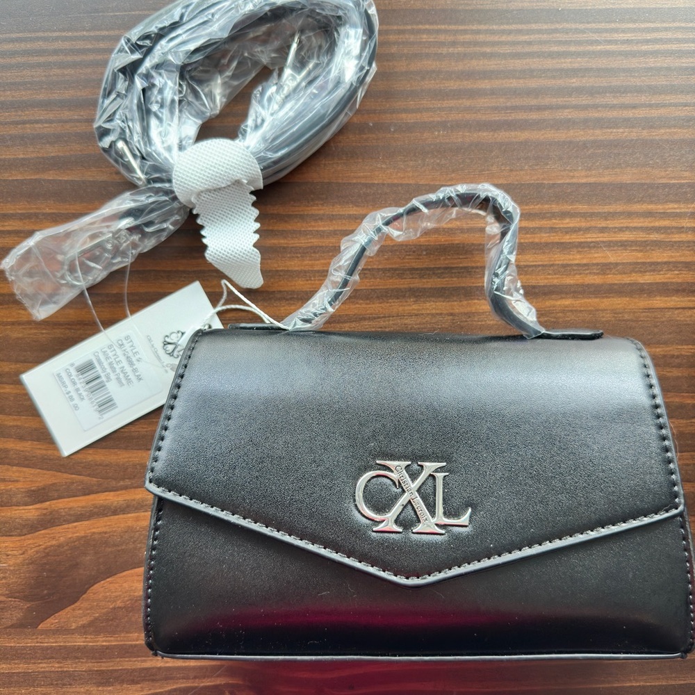 Black top handle bag